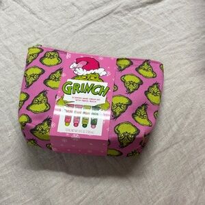 Grinch scented hand cream set with travel pouch.